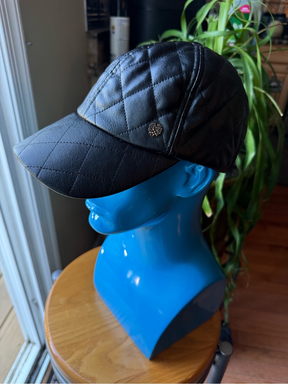 Vince Camuto Black Quilted Baseball Cap with Decorative Emblem